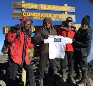 Bill Singh on top of Mt Kilimanjaro